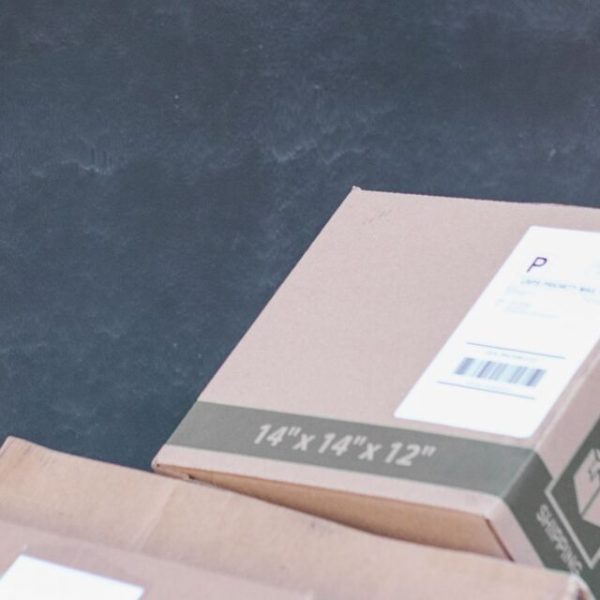 Carrying boxes through a room